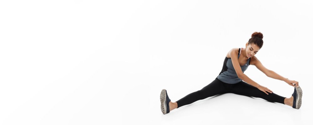 girl in black sport wear doing dynamic stretching to be physical fit.